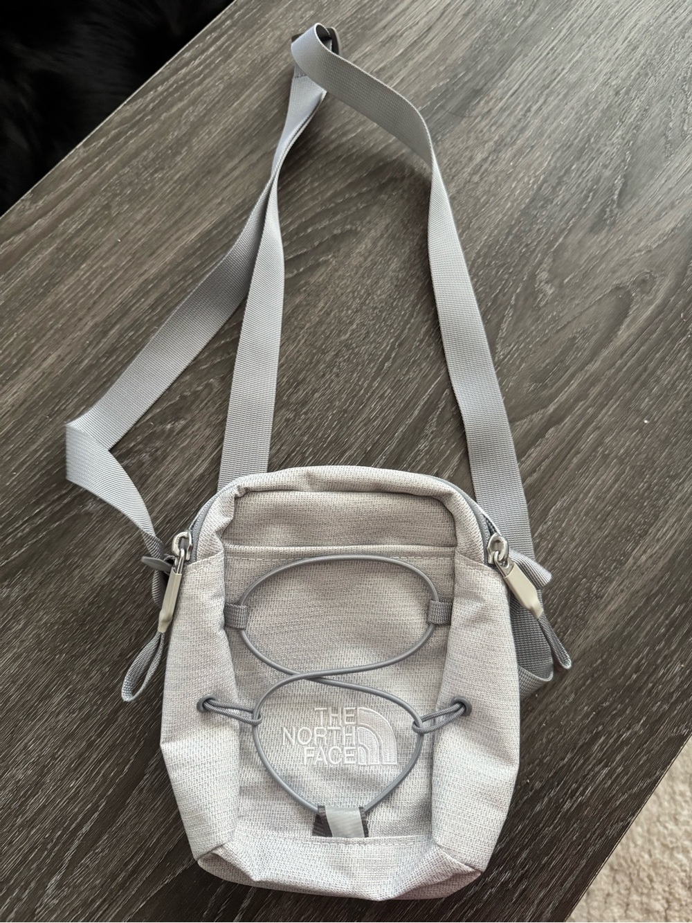 The North Face Light Gray Crossbody Pouch with Front Bungee